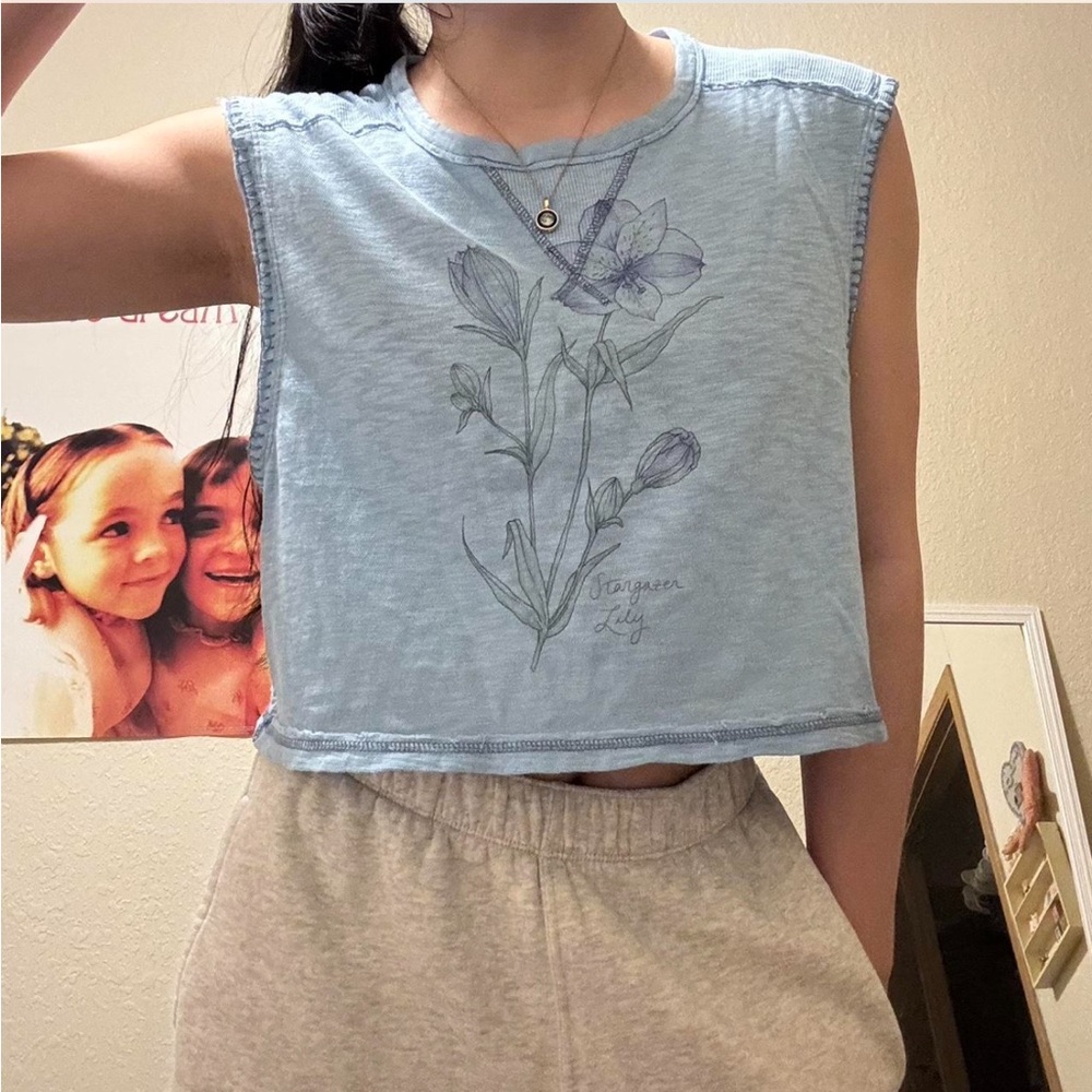 Blue Sleeveless Top with Floral Design